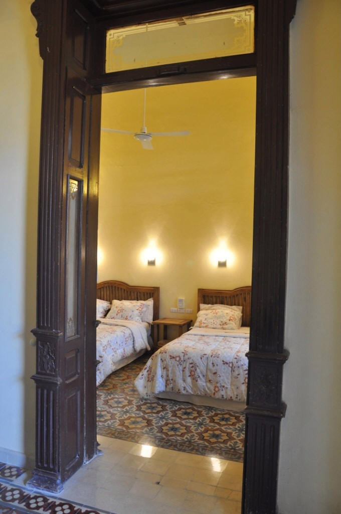 hotel guest room suites queen beds antique doors